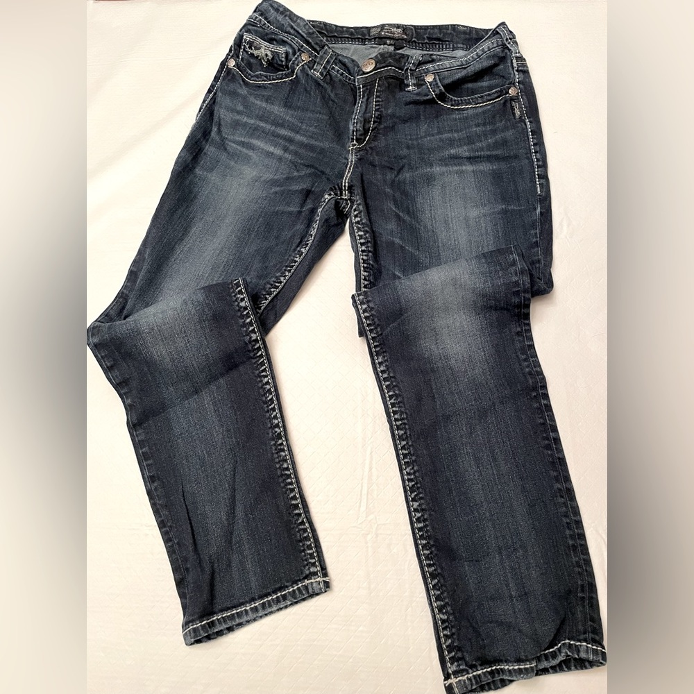 Silver Slim Fit Suki mid rise Jeans. 26” inseam distressed Size 14/31